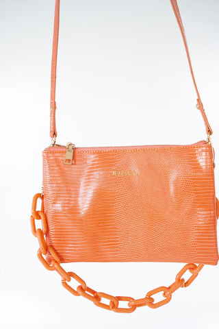 MEDIUM LIZARD PRINT CLUTCH IN CORAL - Love Marlow