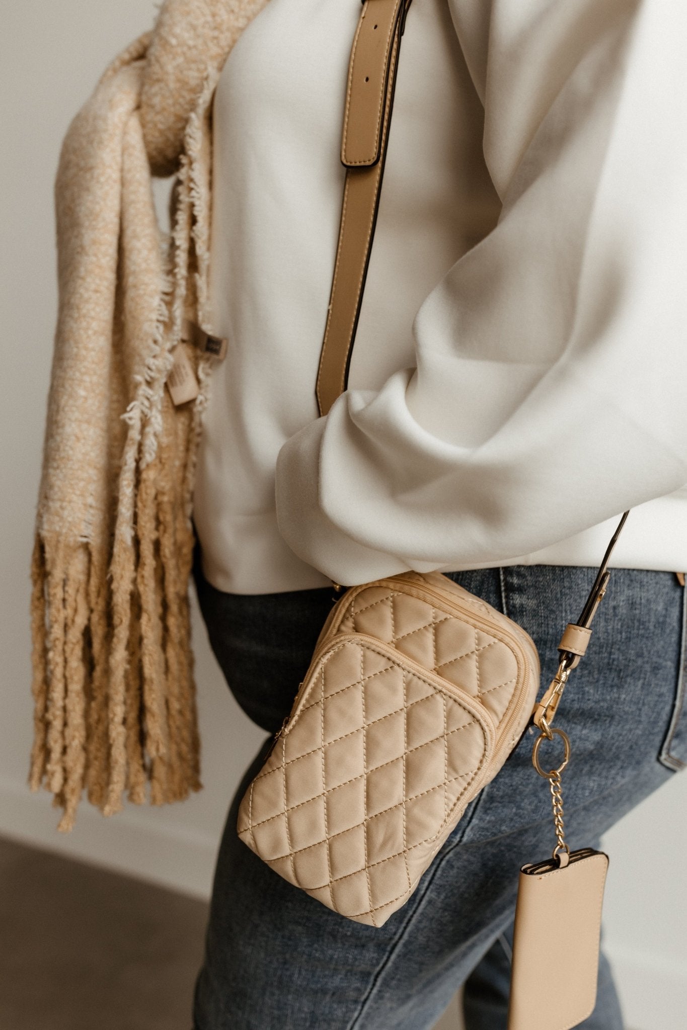 QUILTED CROSSBODY SLING BAG IN TAN - Love Marlow