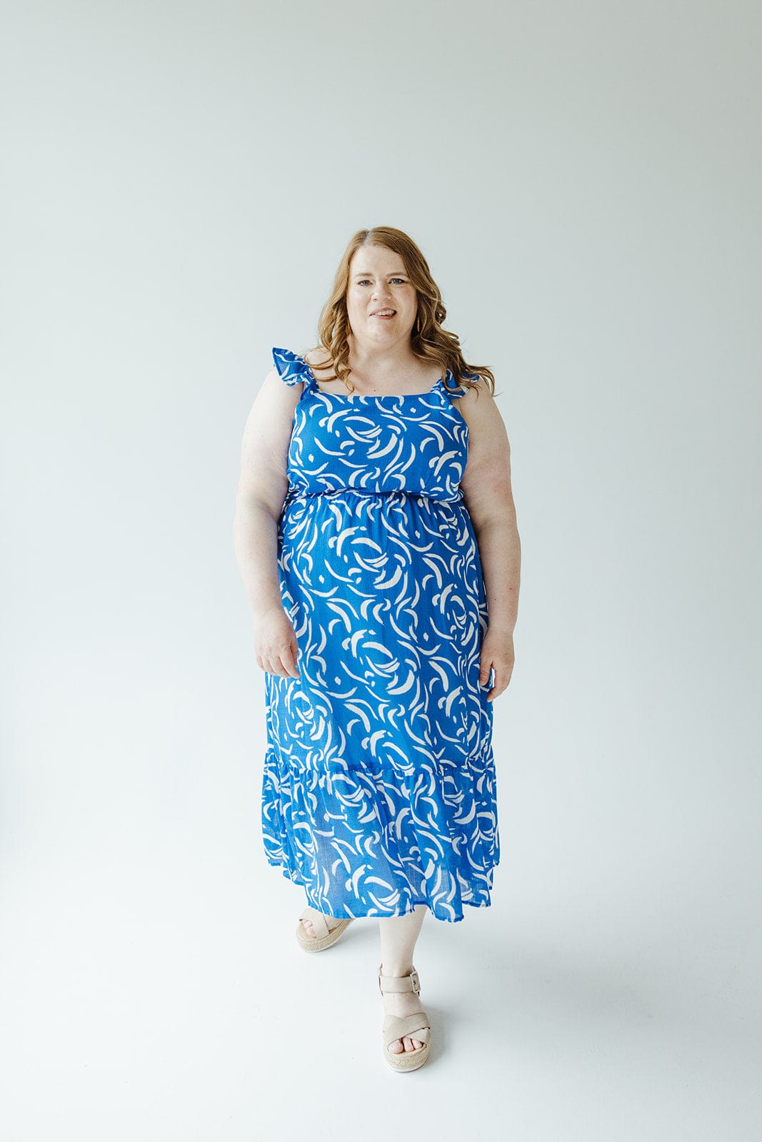 RUFFLE STRAP KICK HEM ABSTRACT PATTERN MIDI DRESS - Love Marlow