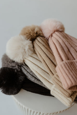 SOLID RIBBED KNIT BEANIE WITH PUFF IN TAUPE - Love Marlow