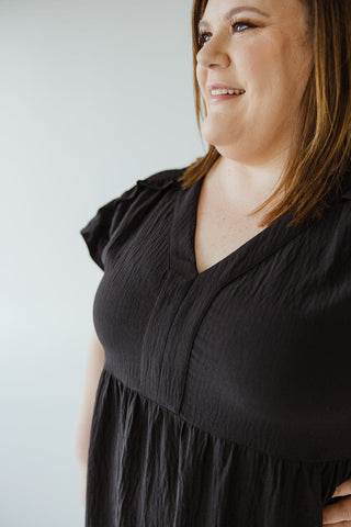 SOLID WOVEN TIERED DRESS WITH FLUTTER SLEEVE IN BLACK - Love Marlow