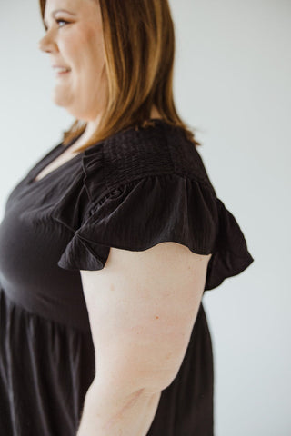 SOLID WOVEN TIERED DRESS WITH FLUTTER SLEEVE IN BLACK - Love Marlow