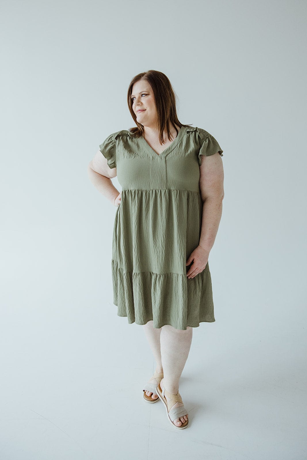 SOLID WOVEN TIERED DRESS WITH FLUTTER SLEEVE IN CACTUS - Love Marlow