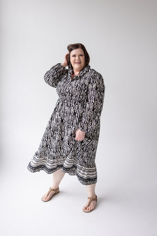 TEXTURED DRESS WITH RUFFLE HEM - Love Marlow