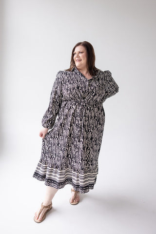 TEXTURED DRESS WITH RUFFLE HEM - Love Marlow