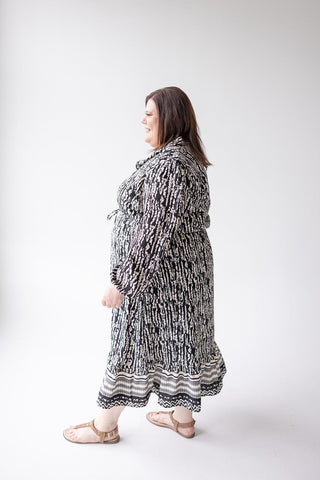 TEXTURED DRESS WITH RUFFLE HEM - Love Marlow