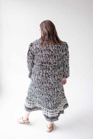 TEXTURED DRESS WITH RUFFLE HEM - Love Marlow
