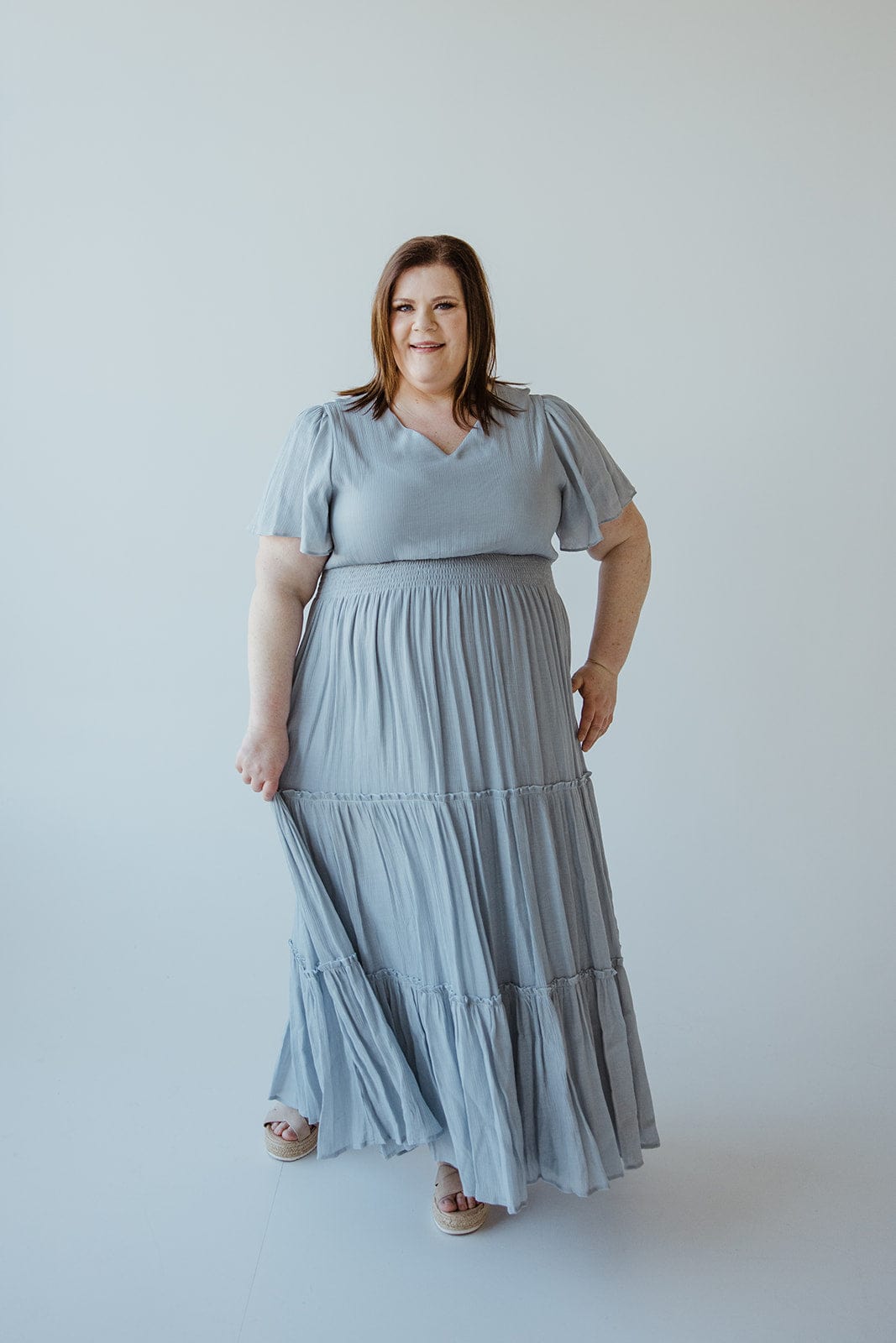 TIERED FLUTTER SLEEVE DRESS IN CHAMBRAY BLUE - Love Marlow
