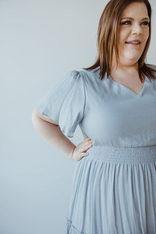 TIERED FLUTTER SLEEVE DRESS IN CHAMBRAY BLUE - Love Marlow