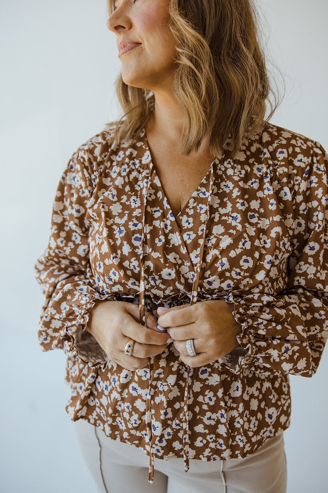 V - NECK LONG SLEEVE PEPLUM SHIRT IN ABSTRACT FLORAL - Love Marlow