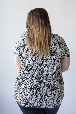 V - NECK TUNIC WITH ABSTRACT ANIMAL PRINT DETAIL - Love Marlow