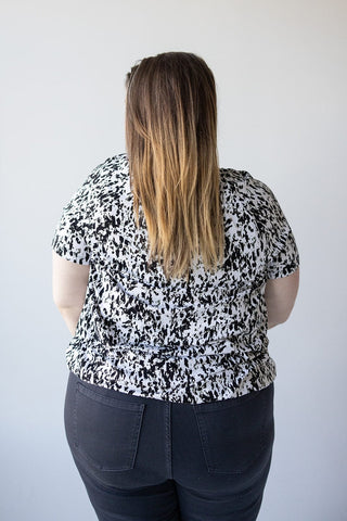 V - NECK TUNIC WITH ABSTRACT ANIMAL PRINT DETAIL - Love Marlow