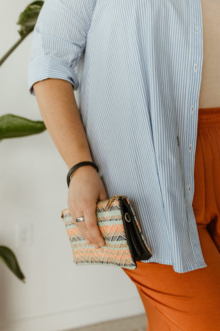 WOVEN STRAW CLUTCH WITH FAUX LEATHER DETAILS IN STRAWBERRY MINT - Love Marlow