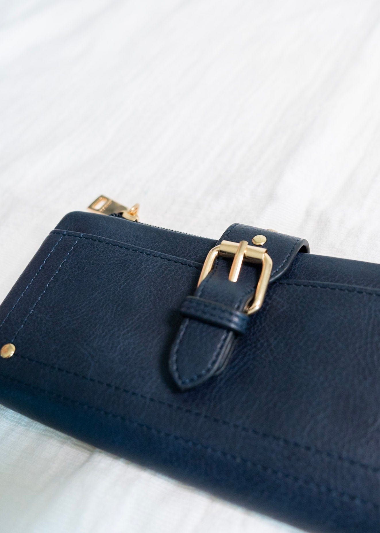 WRISTLET WALLET WITH BUCKLE DETAIL IN NAVY - Love Marlow