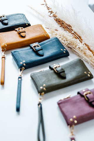WRISTLET WALLET WITH BUCKLE DETAIL IN NAVY - Love Marlow