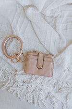 BANGLE WRISTLET WALLET IN ROSE GOLD