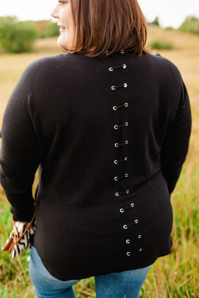 CLASSIC CREWNECK SWEATER WITH EYELET BACK DETAIL IN BLACK