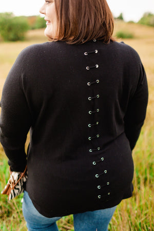 
            
                Load image into Gallery viewer, CLASSIC CREWNECK SWEATER WITH EYELET BACK DETAIL IN BLACK
            
        
