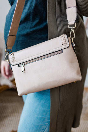 CROSSBODY WITH WHIPSTITCH DETAIL IN BEIGE