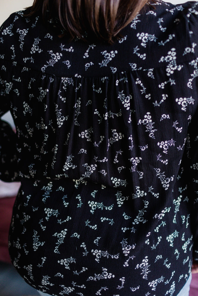 
            
                Load image into Gallery viewer, DAINTY FLORAL RUFFLE BLOUSE WITH BUTTONS IN BLACK
            
        