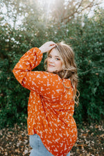 DAINTY FLORAL RUFFLE BLOUSE WITH BUTTONS IN PERSIMMON