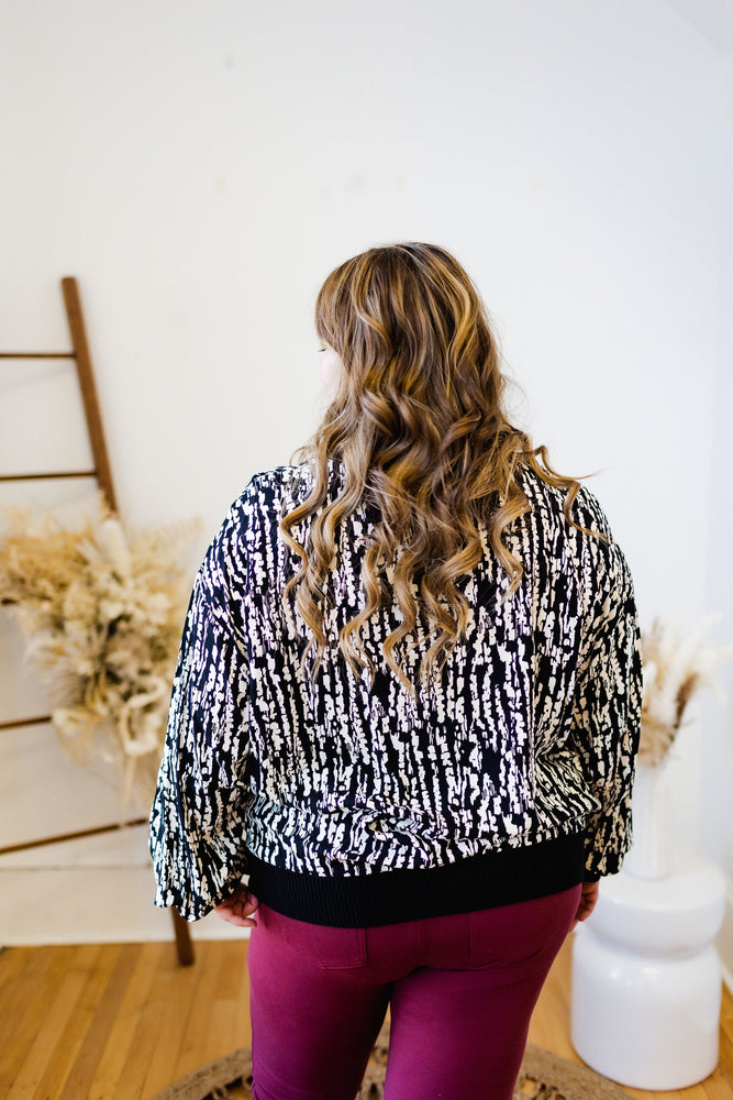 FLOWY ABSTRACT PRINT BLOUSE