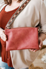 MEDIUM FAUX LEATHER CLUTCH IN TERRACOTTA