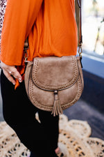 ROUND MEDIUM SATCHEL WITH STITCH AND TASSEL DETAIL IN CLAY