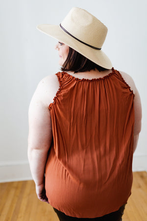 
            
                Load image into Gallery viewer, RUFFLE NECKLINE CREPE TANK IN RUST
            
        