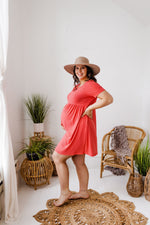 SOLID RIBBED DRESS WITH BUTTON DETAIL IN CORAL