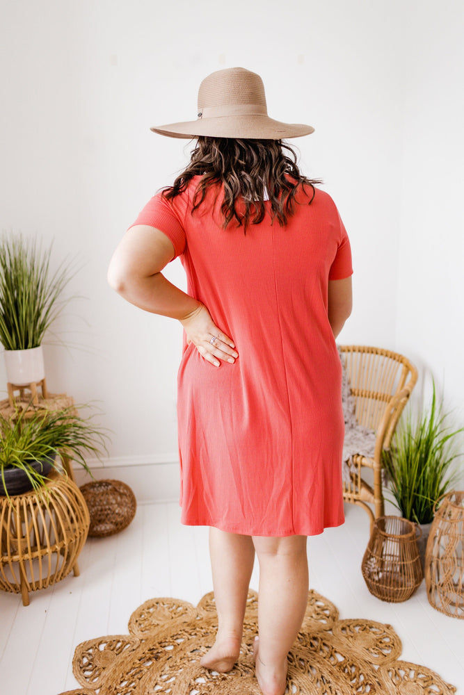 SOLID RIBBED DRESS WITH BUTTON DETAIL IN CORAL