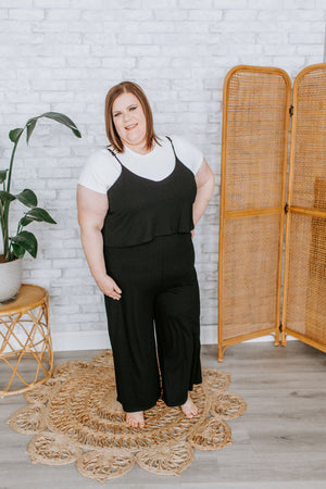 SOLID RIBBED JUMPSUIT IN BLACK