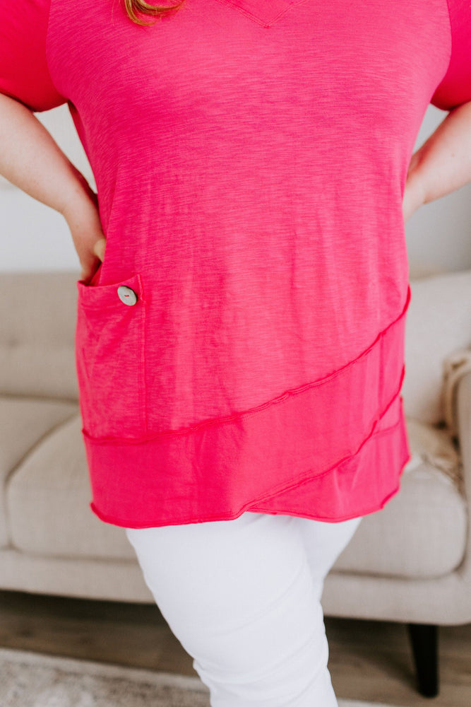 V-NECK TUNIC WITH ASYMMETRICAL HEM IN GLAM PINK