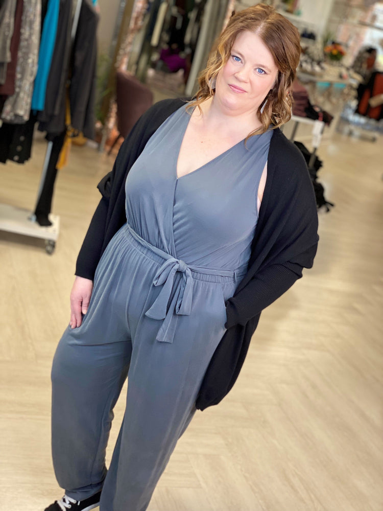 SOLID WRAP JUMPSUIT WITH TIE FRONT